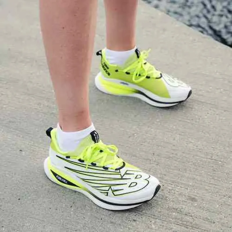 Stylish New Balance Fuelcell Rc Elite V2 Shoes For Men (BME178) Stylish New Balance Fuelcell Rc Elite V2 Shoes For Men (BME178)